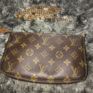 SOLD. Louis Vuitton Pochette Accessories